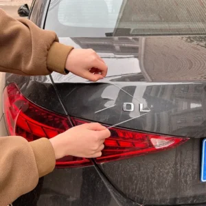 1 قطعة شعار السيارة السيارات جوج فاصل الذيل رسالة تجريد يده أداة إزالة الصواميل قاعدة بلاستيكية ضبط السيارة الملحقات - Image 1